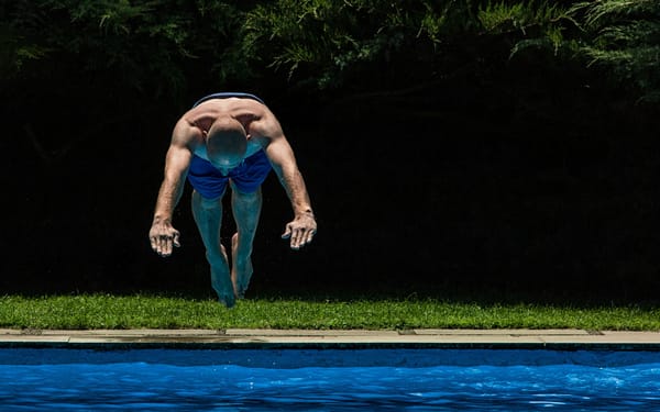 Bald man taking the plunge 